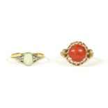 A gold single stone opal ring, with diamond set shoulders, marked 18ct and PLAT, 2.21g, and a