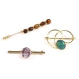 A gold single stone oval cut amethyst bar brooch, marked 9ct, 3.44g, a gold five stone citrine and