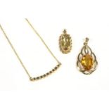 A 9ct gold oval citrine pendant, 1.96g, a 9ct gold paste stone pendant, 2.61g, a sapphire