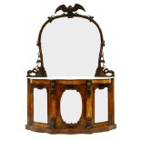 A Victorian walnut side cabinet, the large mirrored back with carved eagle crest, over shaped marble