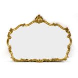 A 19th century style gilt framed wall mirror, with shell carved crest over a shaped plate, 120cm x