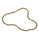 A 9ct gold panther and cross link chain necklace, 16.40g