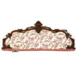 A Victorian carved mahogany and upholstered head board, 210cm wide, 96cm high