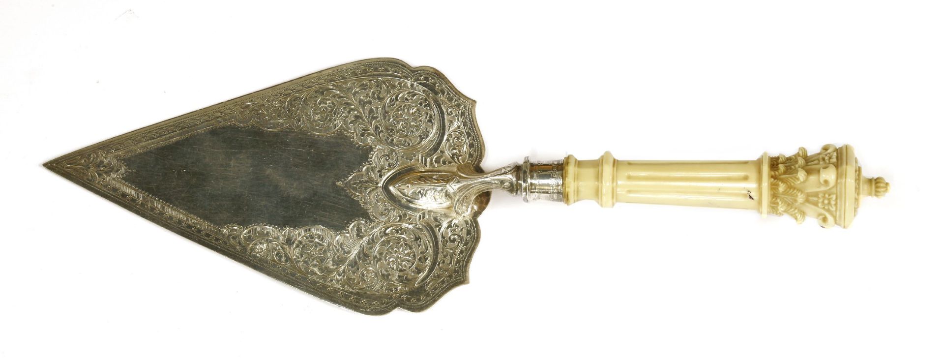 A Victorian silver and ivory ceremonial trowel,by Levesley Brothers, Sheffield, 1877,the handle