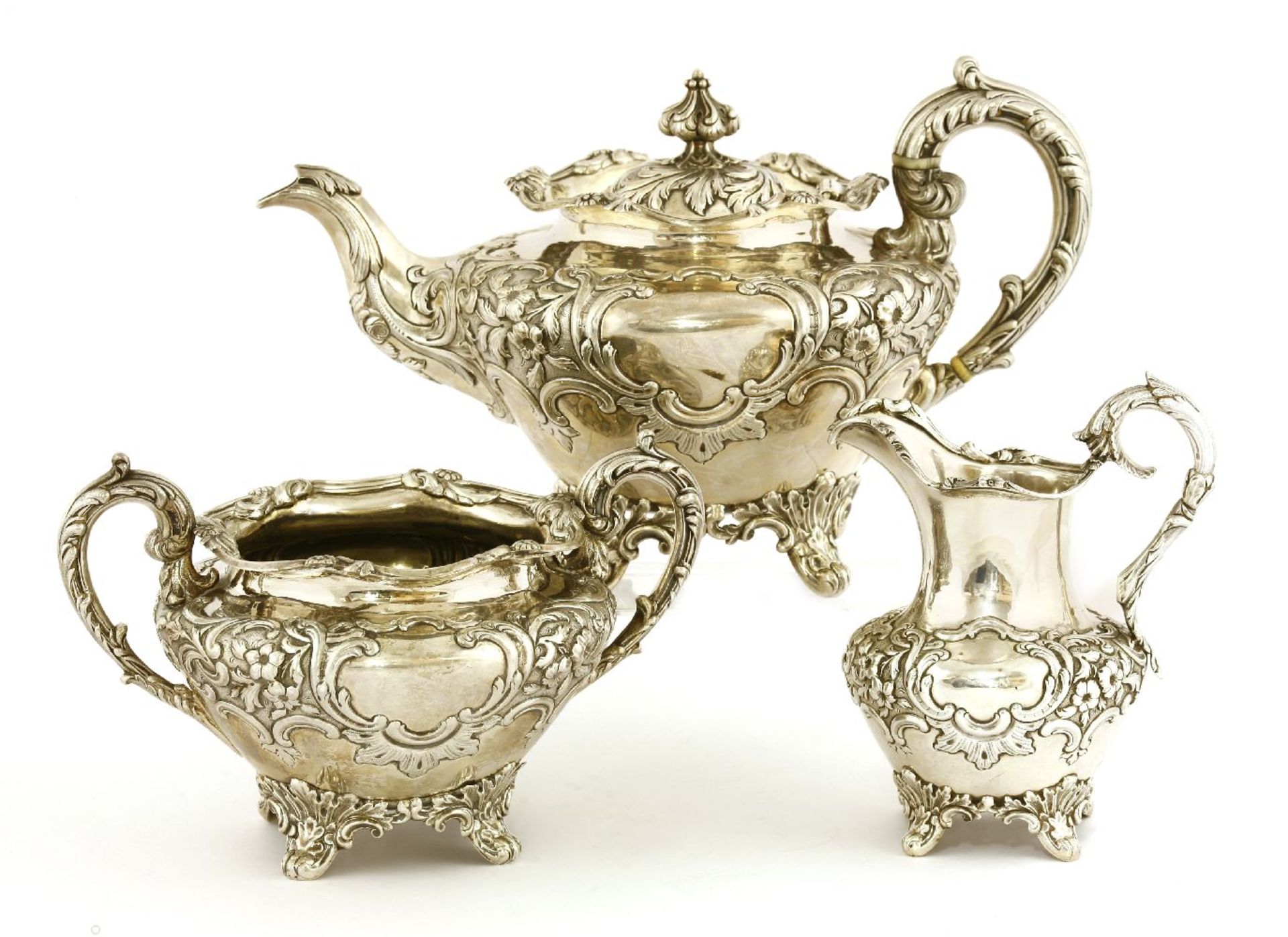 A Victorian silver tea set,William Marshall, Edinburgh 1839,the teapot with a wrythen foliate finial