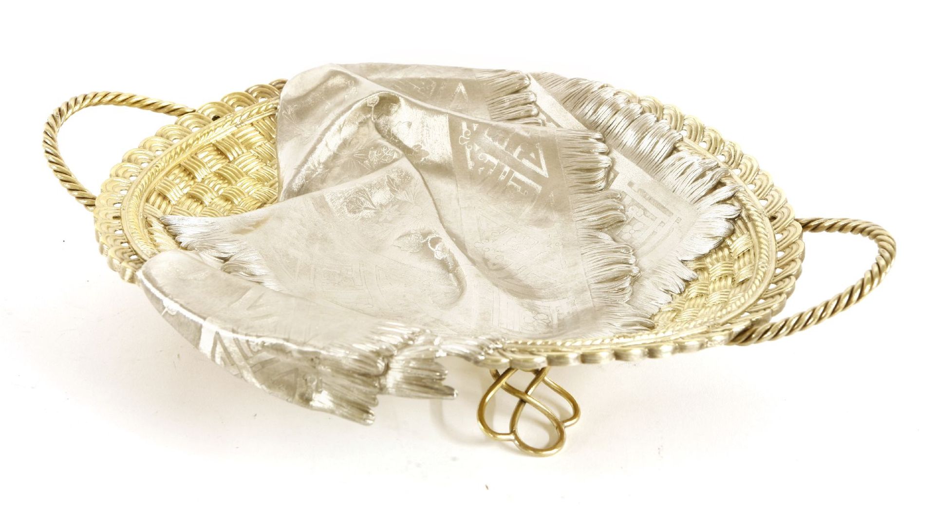 A Russian silver and silver gilt trompe l'oeil bread basket,mark of Chlebnikov, Moscow 1885, marks