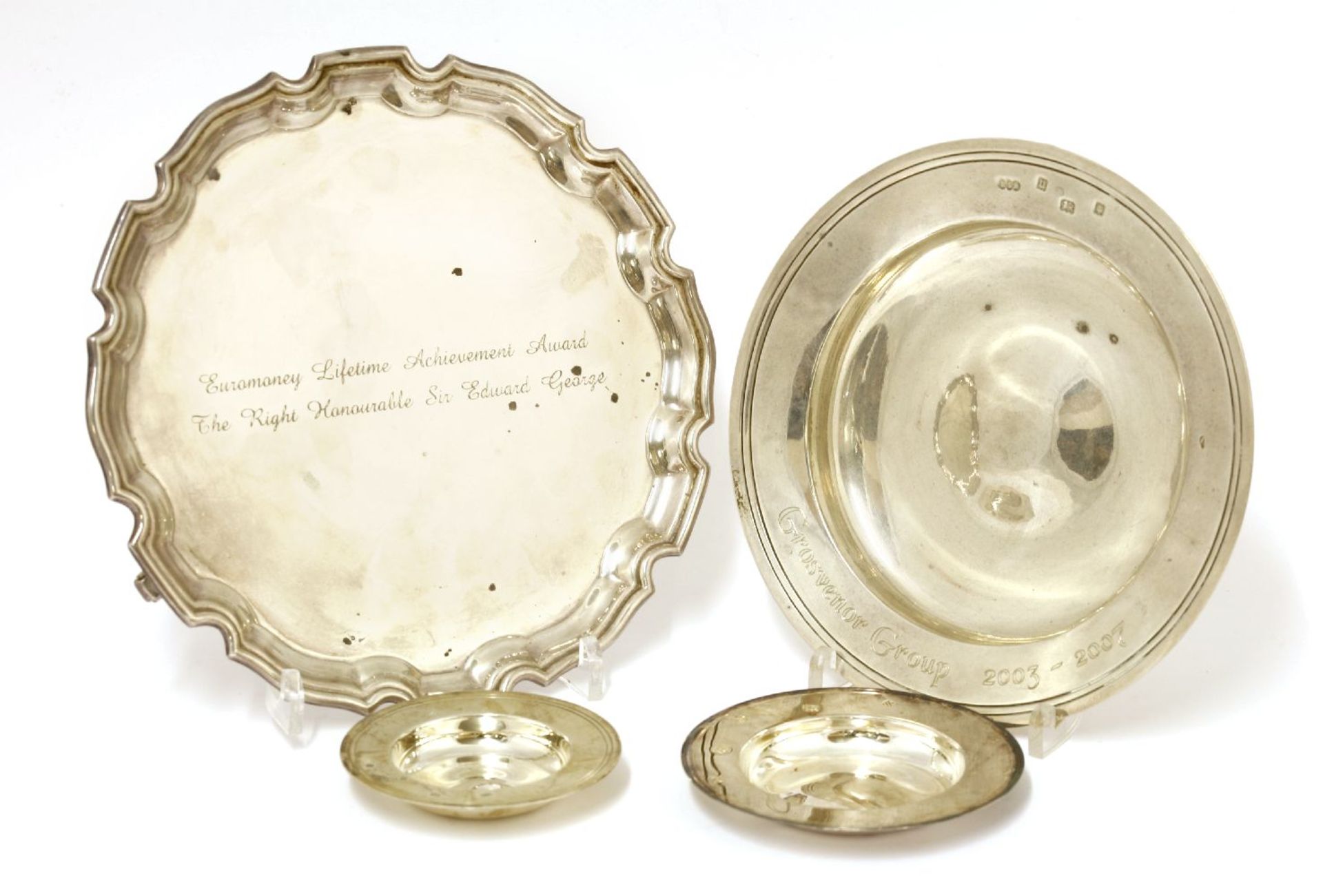 A modern silver salver, Sheffield, Camelot Silverware Ltd., with a Chippendale-style border and on