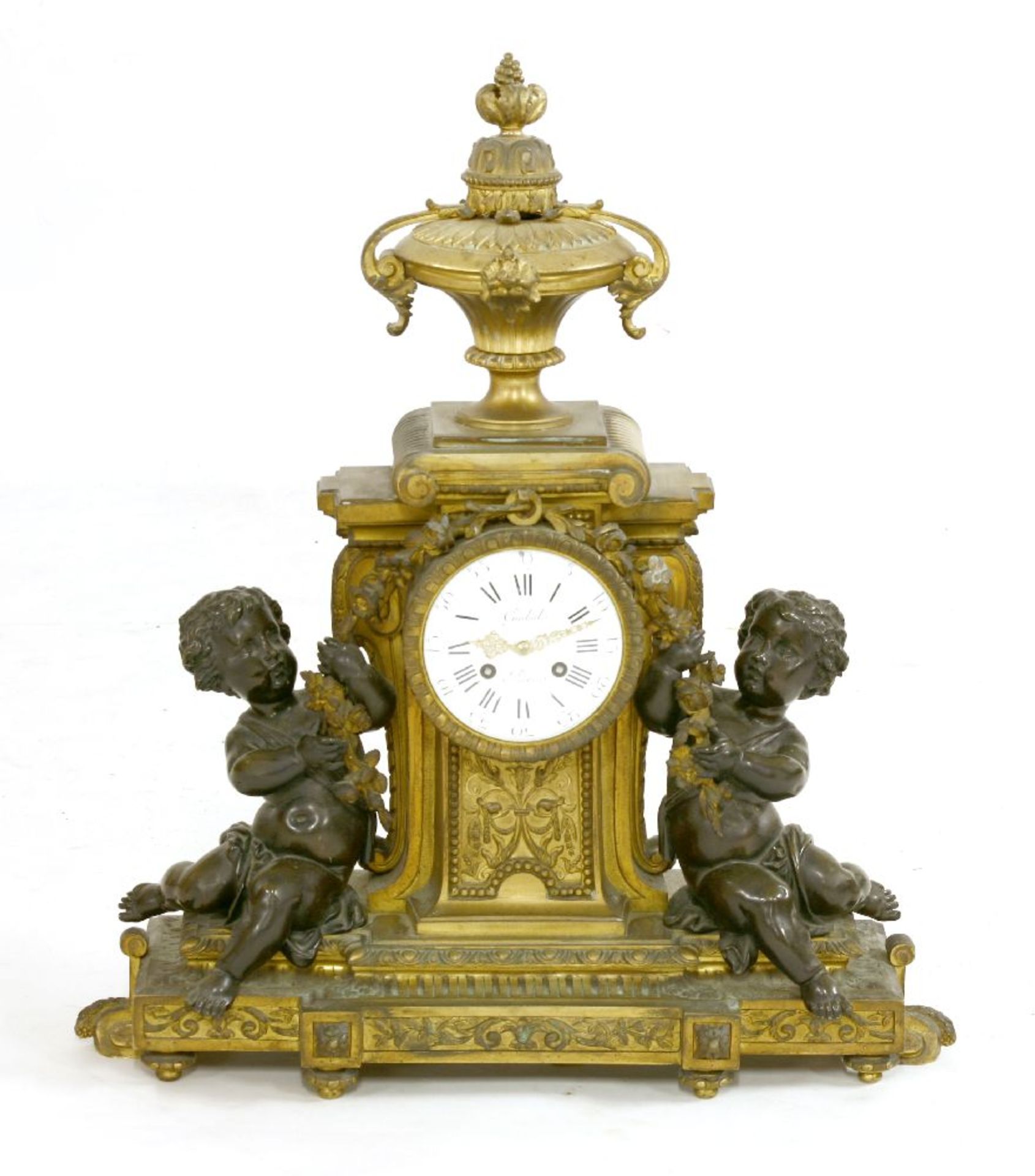 A French gilt bronze mantel clock,the enamelled dial inscribed 'Guibal à Paris', surmounted with