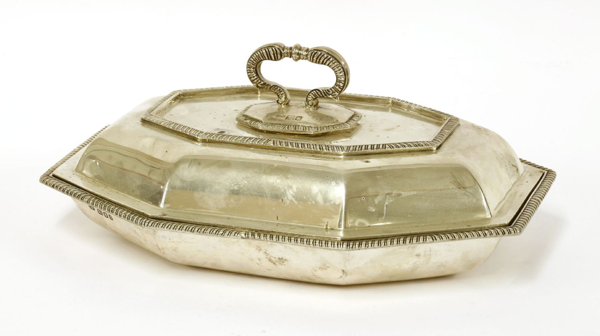 A silver entrée dish and cover,Chrichton Brothers, London 1922, of octagonal from, with detachable