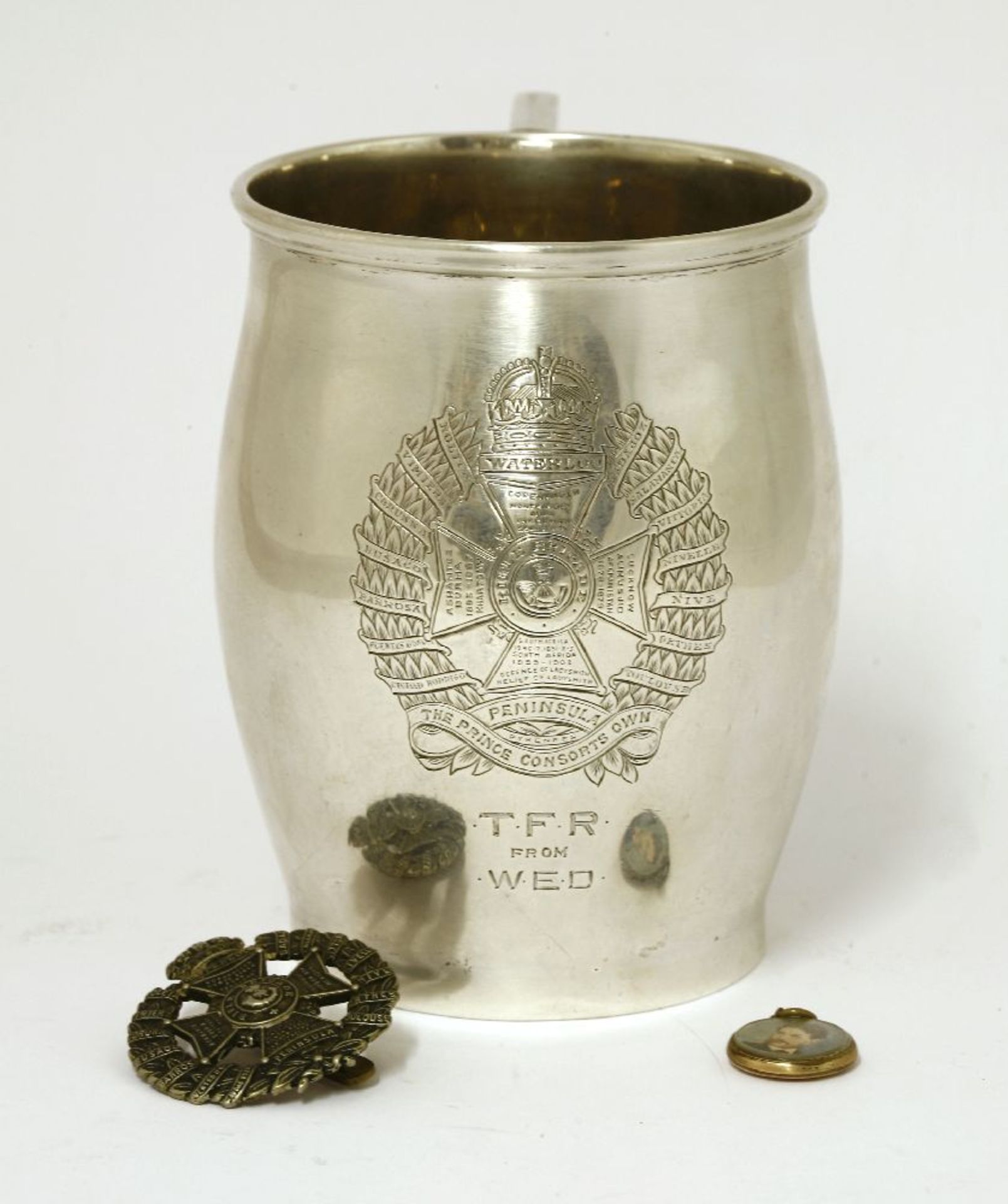 A silver tankard, by Collingwood and Co., London 1924,engraved with the Rifle Brigade badge and 'T.