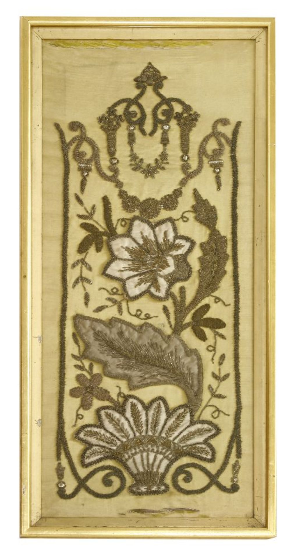 A silk panel early 19th century, with metallic silver and gold applied decoration, trapunto cream