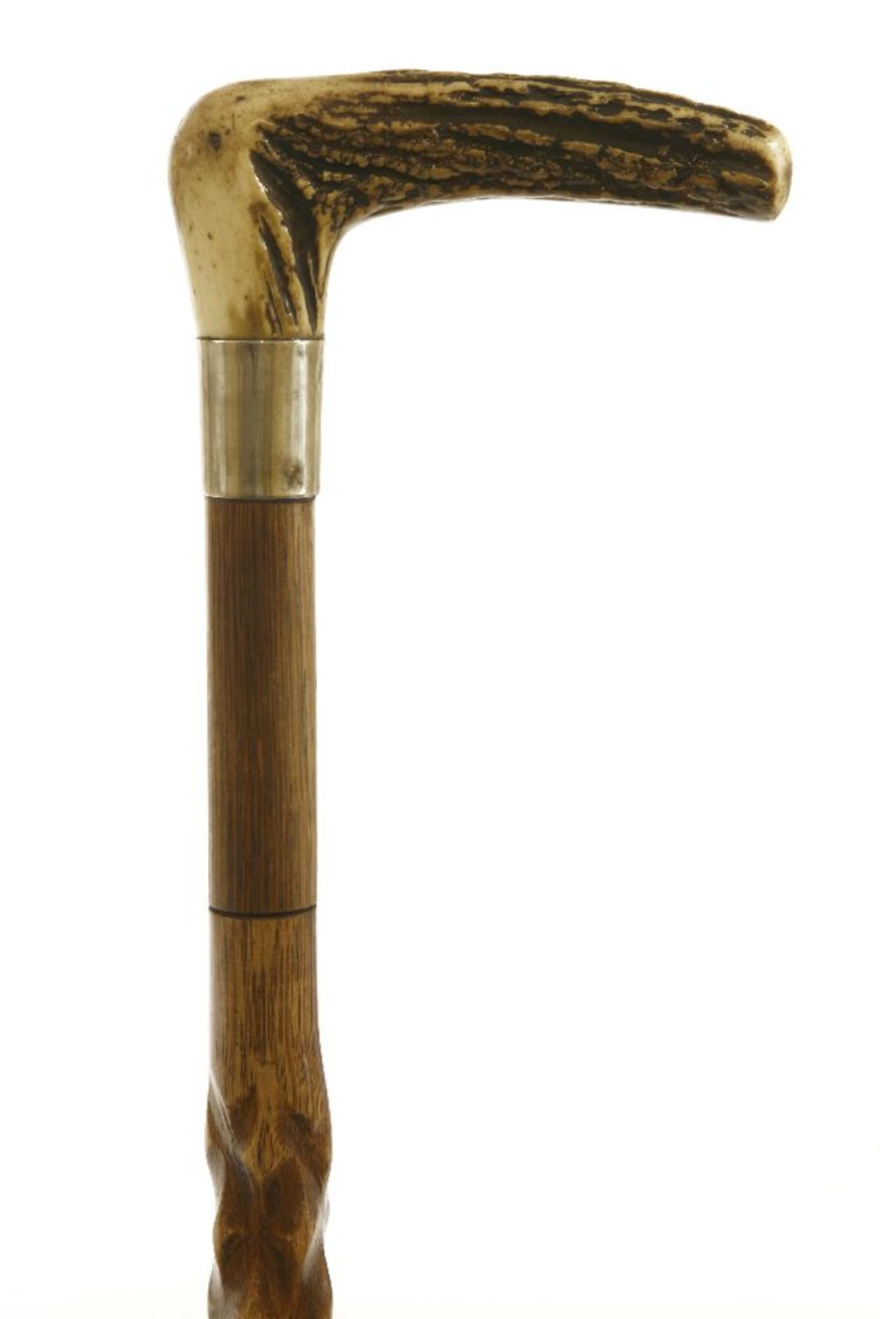 An oak 'barley corn' carved walking stick,with a bone hammer handle, a steel rapier concealed in the