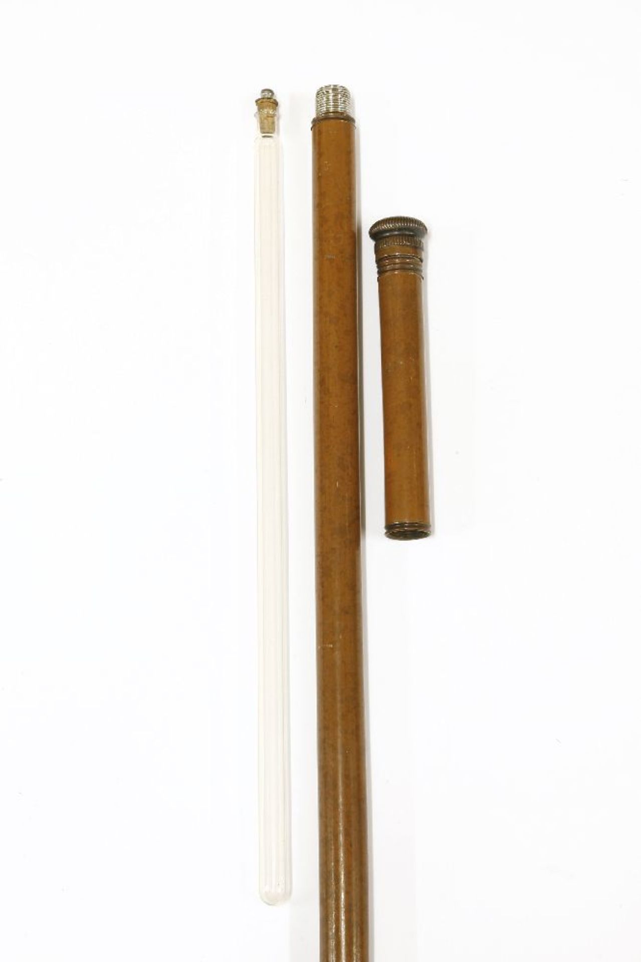 A malacca walking cane,containing a glass vessel, 40cm long, with a stopper in the lower part of the