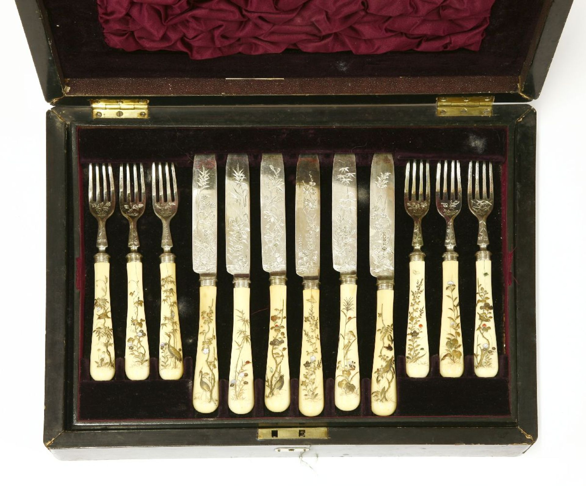 A set of twelve Japanese ivory and Shibayama fruit knives and forks,each handle decorated with