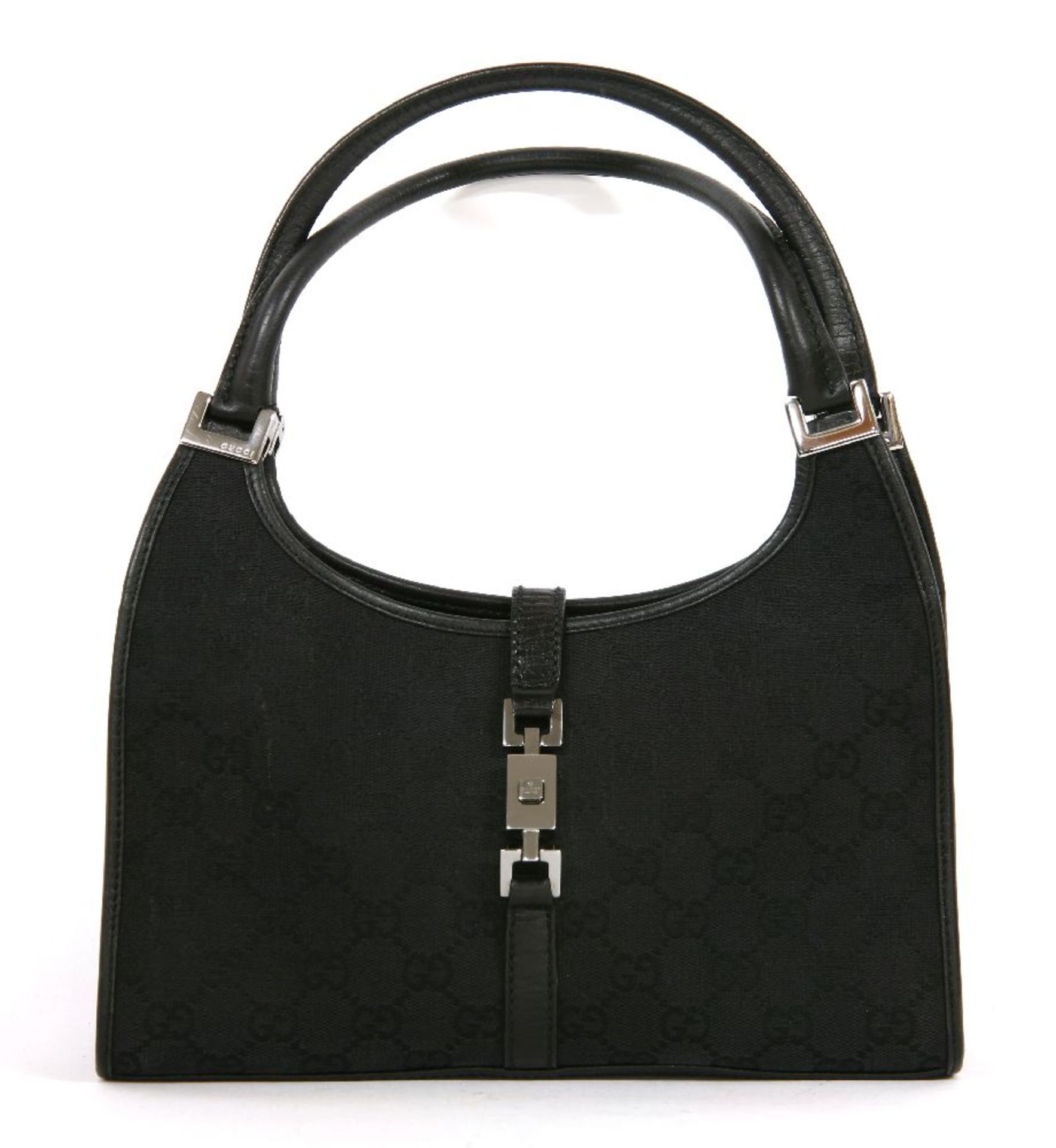 A Gucci 'Jackie' black canvas shoulder bag, with a black canvas exterior with smooth black leather