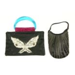 A MAWI black leather clutch handbag, with applied seed, bead and sequin butterfly, with blue Perspex