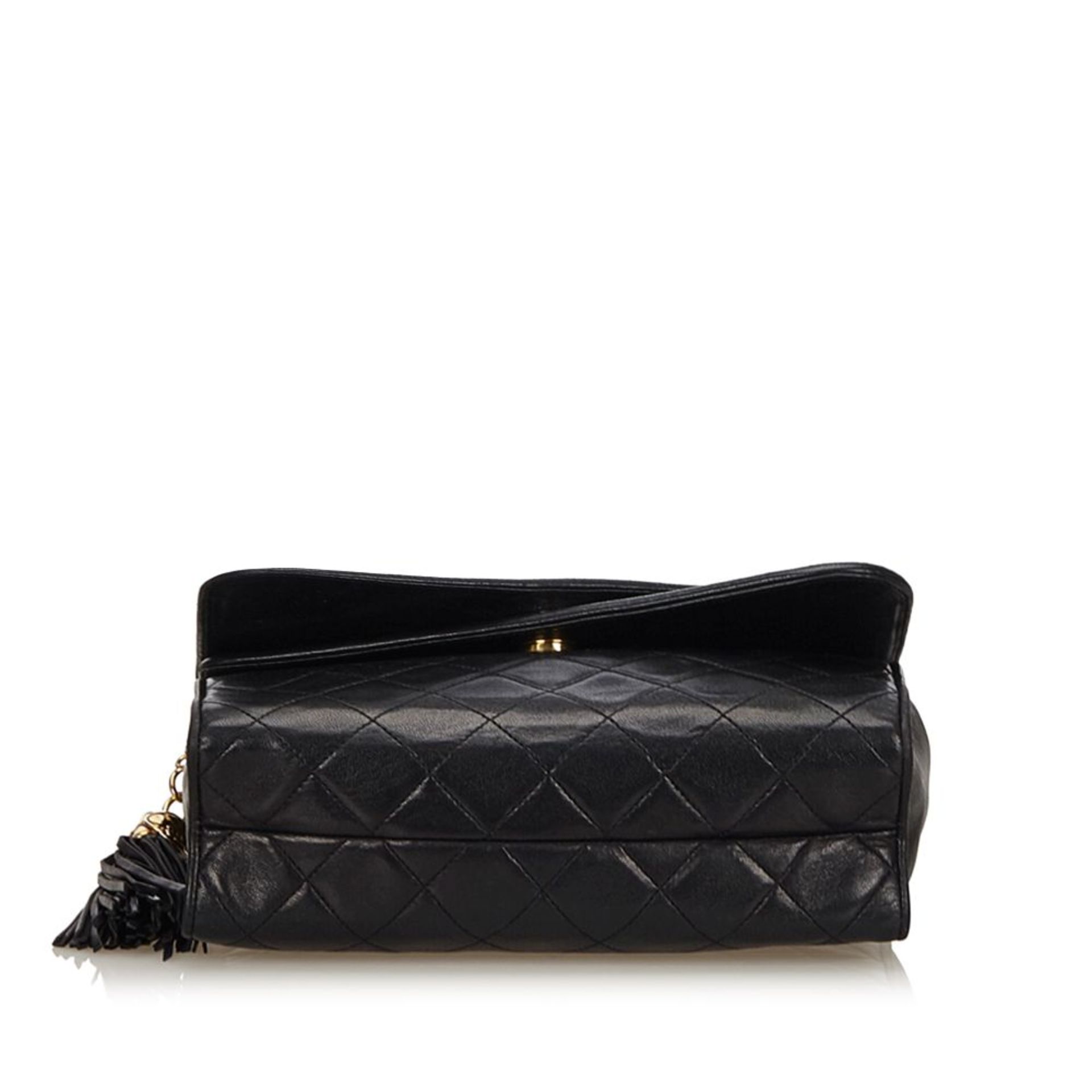 A Chanel matelassé tassel double flap shoulder bag,featuring a lambskin leather body, gold-tone - Image 4 of 5