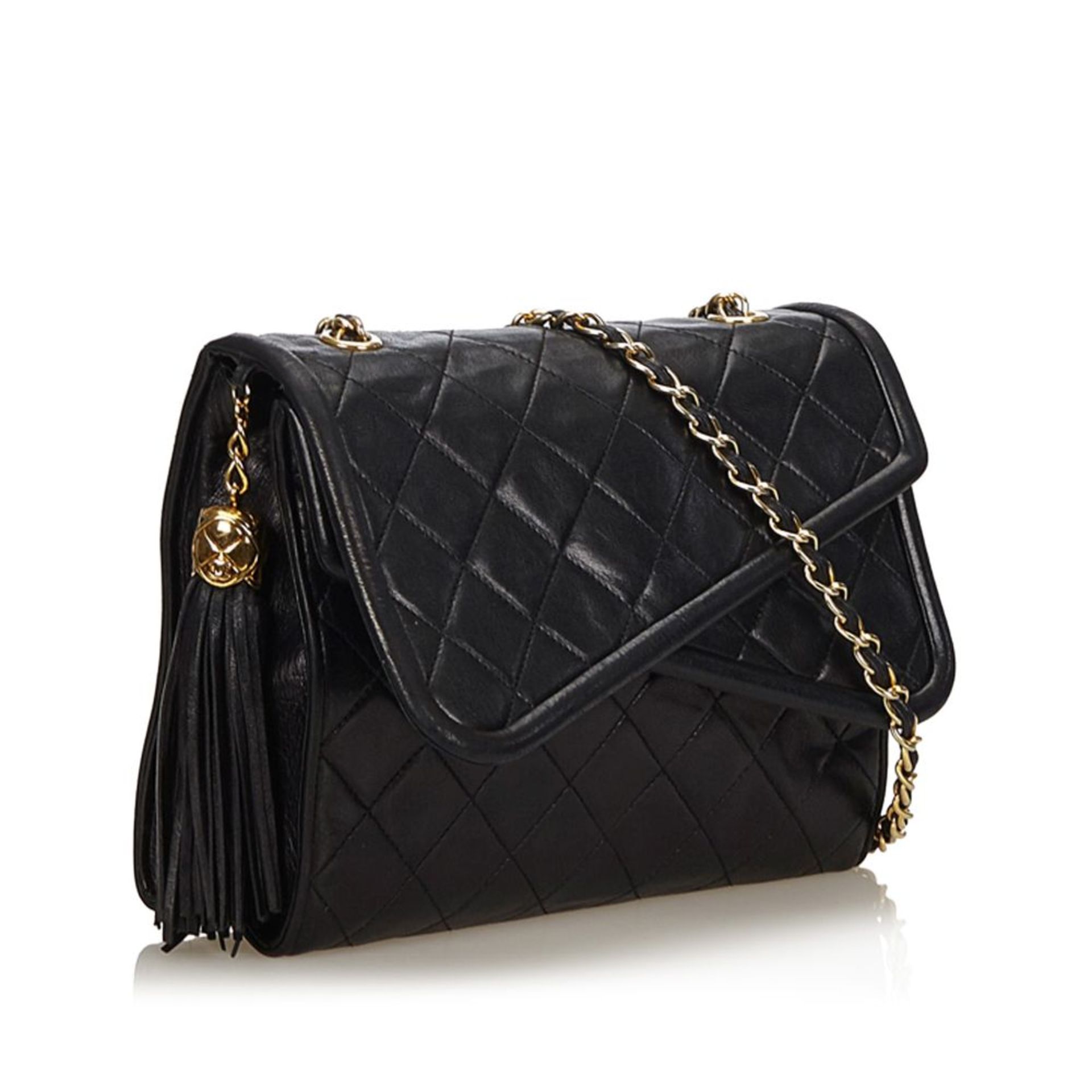 A Chanel matelassé tassel double flap shoulder bag,featuring a lambskin leather body, gold-tone - Image 2 of 5