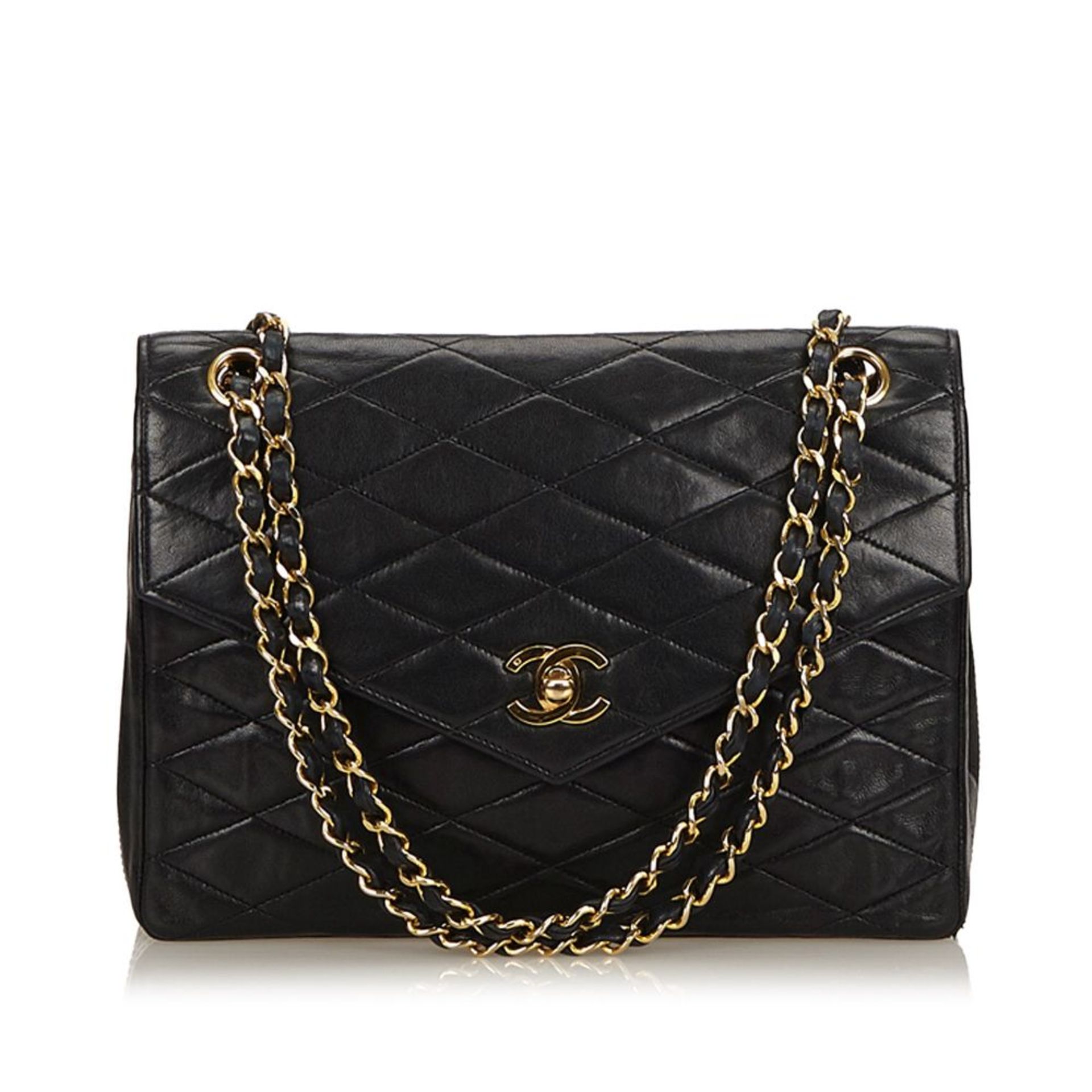 A Chanel matelassé leather chain flap bag,featuring a leather body, exterior back open pocket,