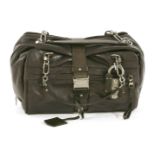A Loewe 'Lola Grand' black leather handbag,with zip closure, twin exterior pockets and buckle,