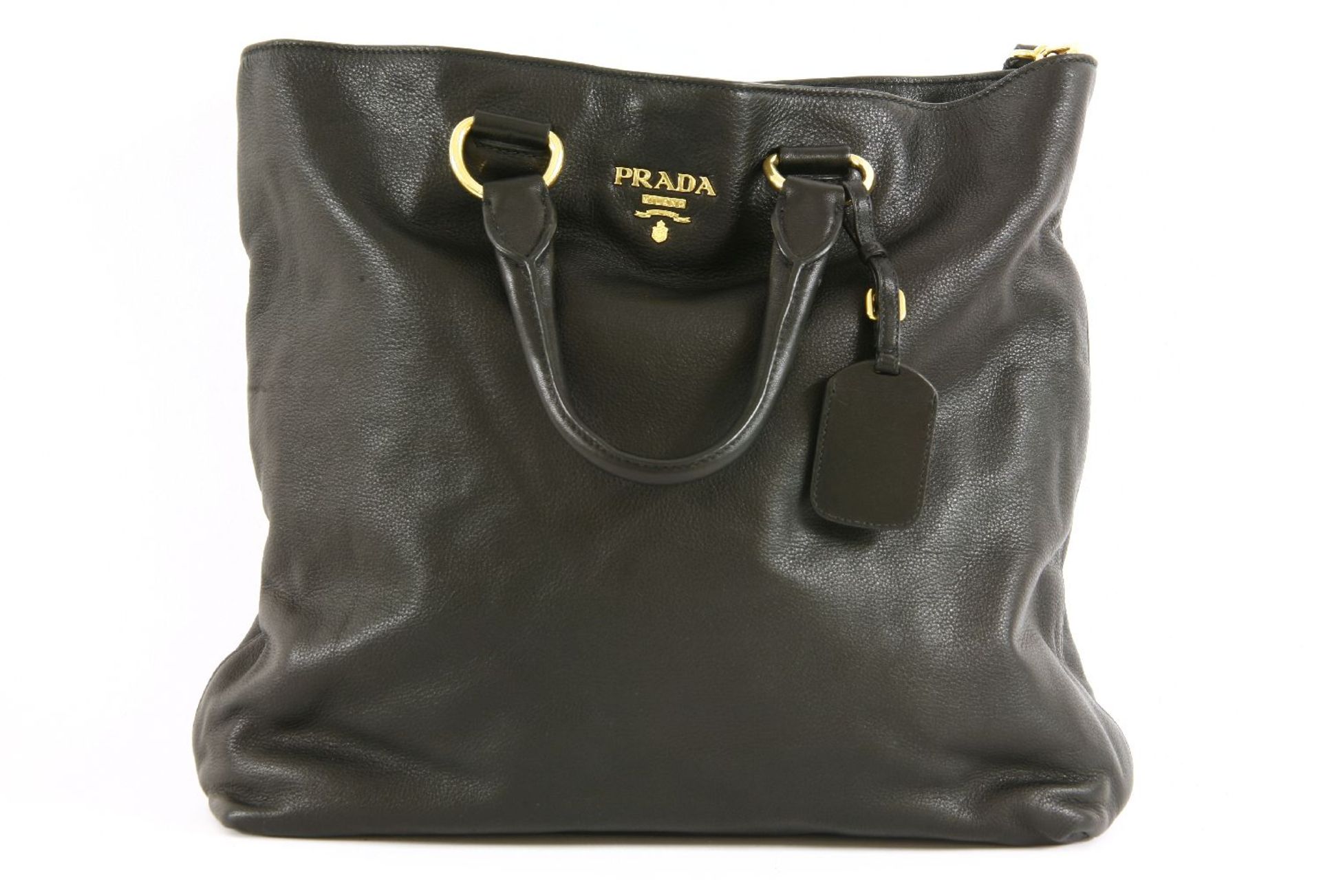 A Prada black leather handbag,featuring a black pebbled leather exterior, gold-tone hardware