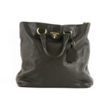 A Prada black leather handbag,featuring a black pebbled leather exterior, gold-tone hardware