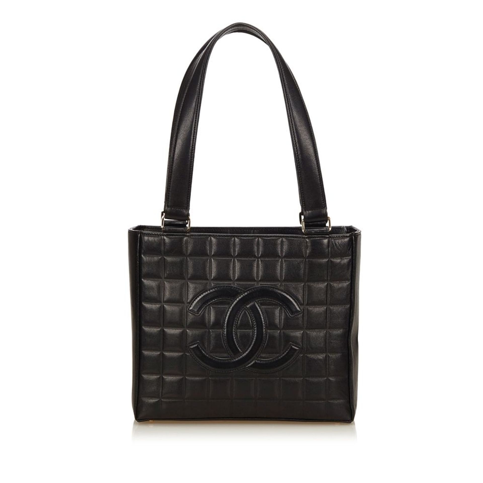 A Chanel 'Choco Bar' leather shoulder bag,with a leather body, a flat leather strap, an open top,