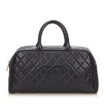 A Chanel caviar leather bowling handbag,this Boston bag features a quilted caviar leather body, with