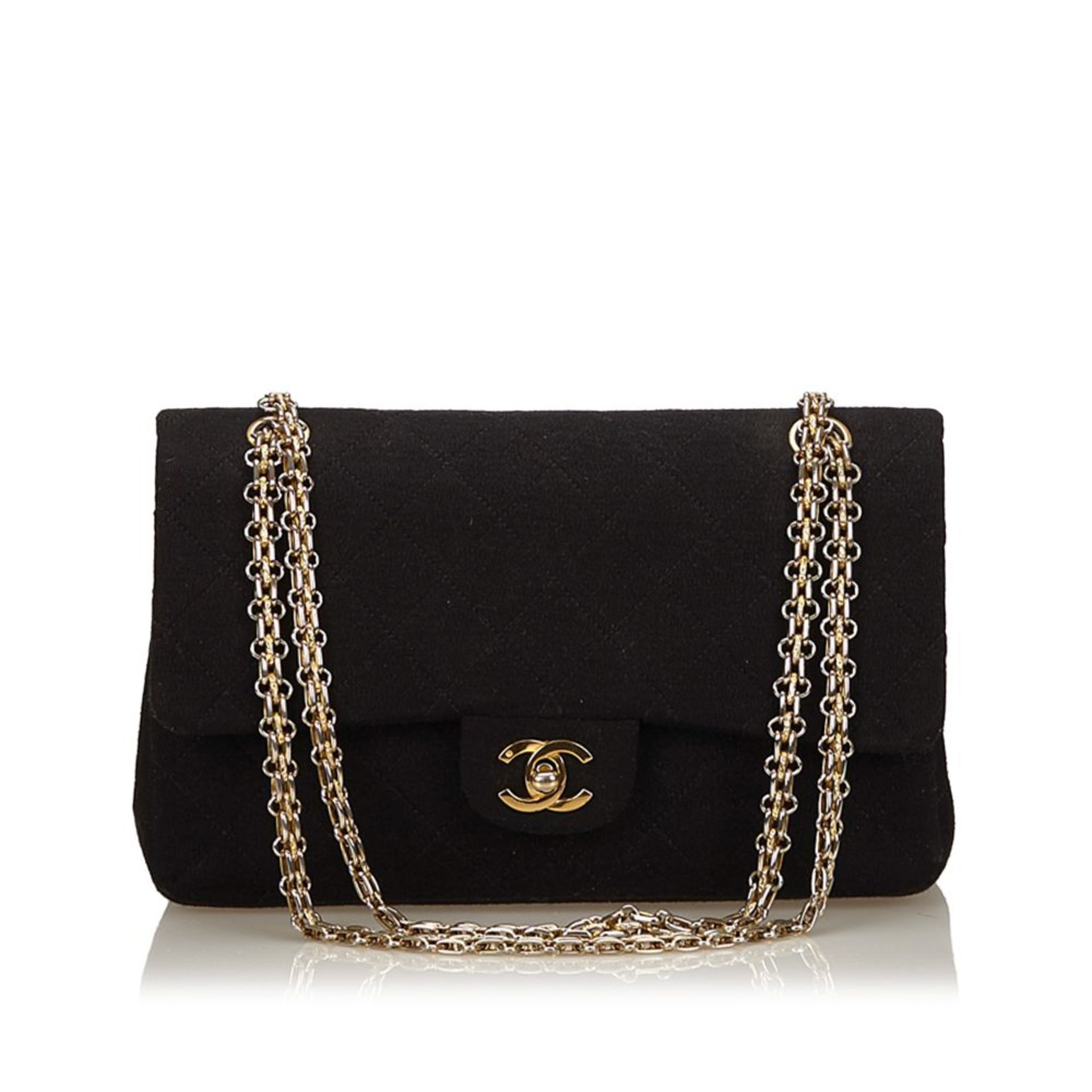 A Chanel classic medium cotton double flap shoulder bag,featuring a quilted cotton body with chain
