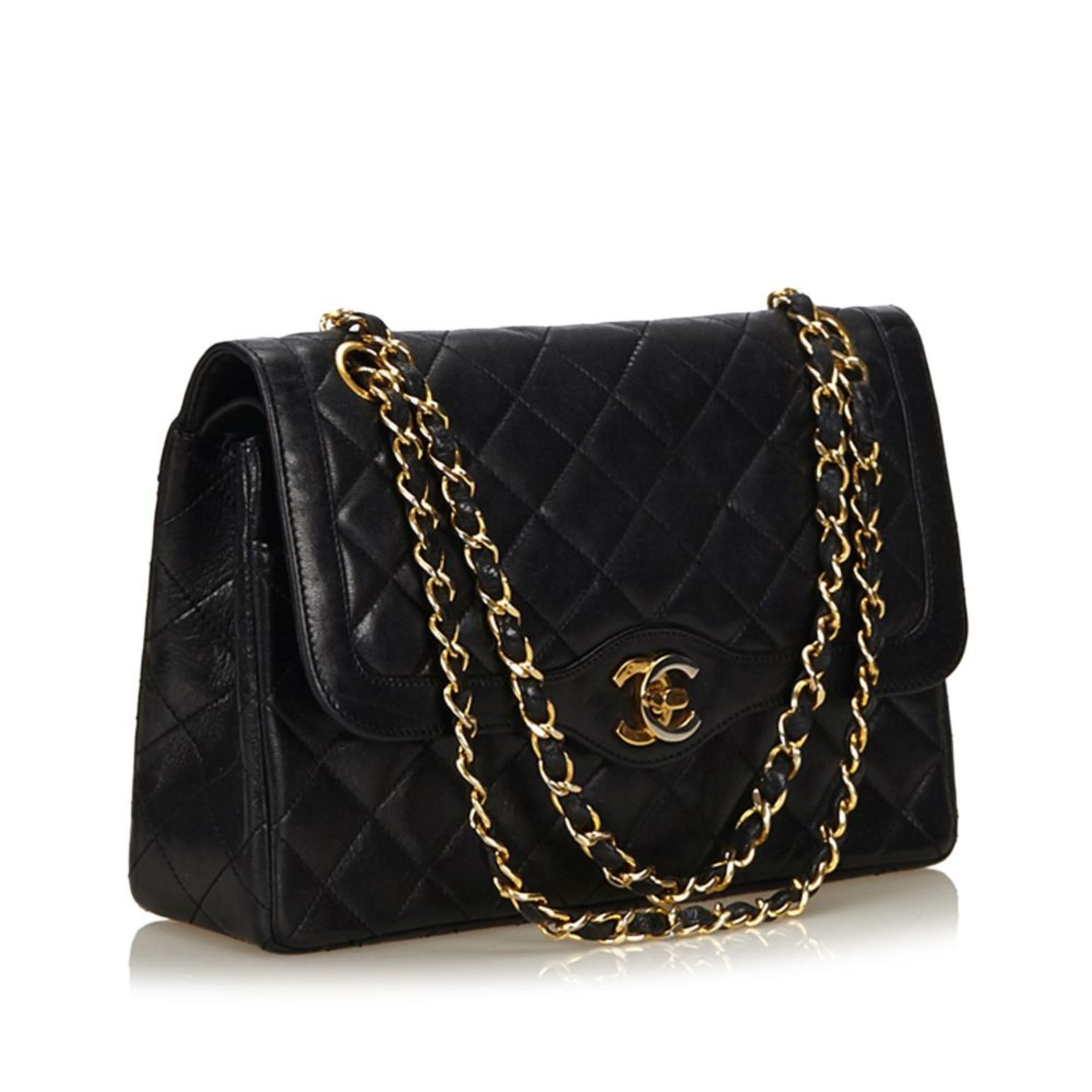 A Chanel matelassé leather flap handbag,featuring a leather body, gold-tone chains, a front flap - Image 2 of 6