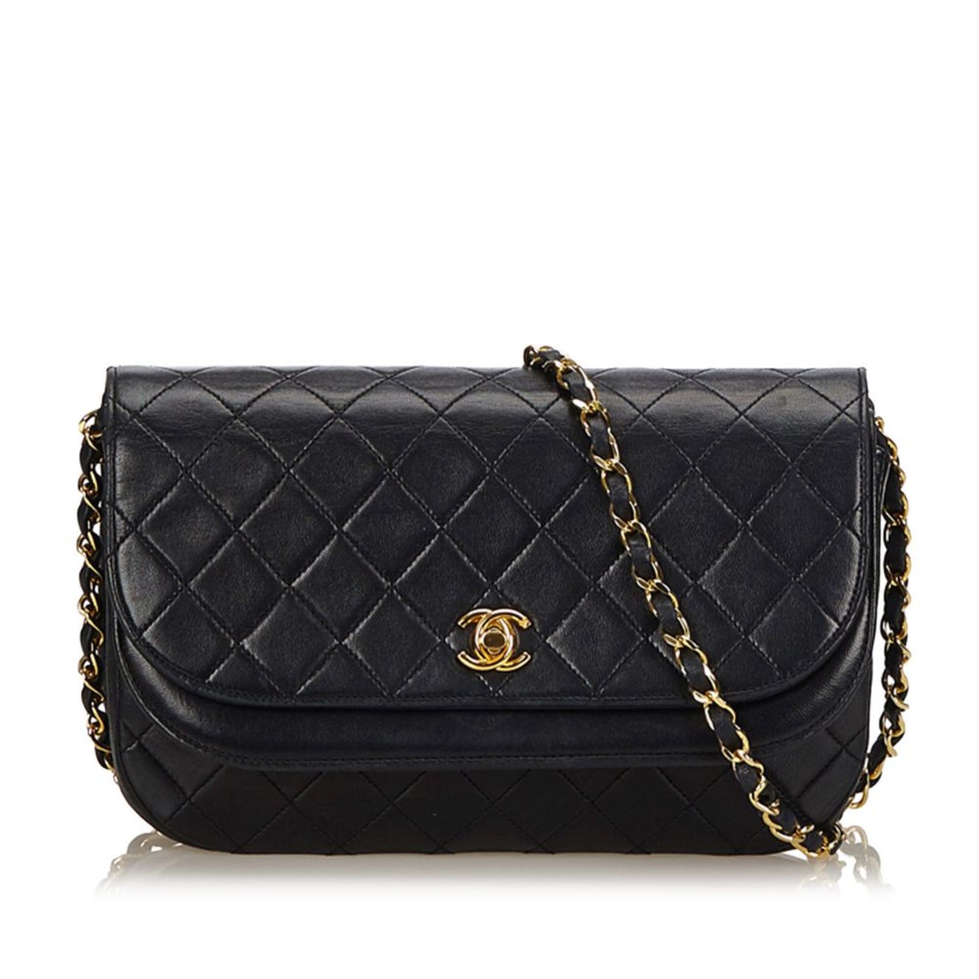 A Chanel matelassé half moon flap shoulder bag,with a leather body, gold-tone chains, a double