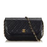 A Chanel matelassé half moon flap shoulder bag,with a leather body, gold-tone chains, a double