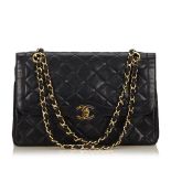 A Chanel matelassé leather flap handbag,featuring a leather body, gold-tone chains, a front flap