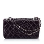 A Chanel matelassé patent leather shoulder bag,a patent leather body, exterior back slip pocket,