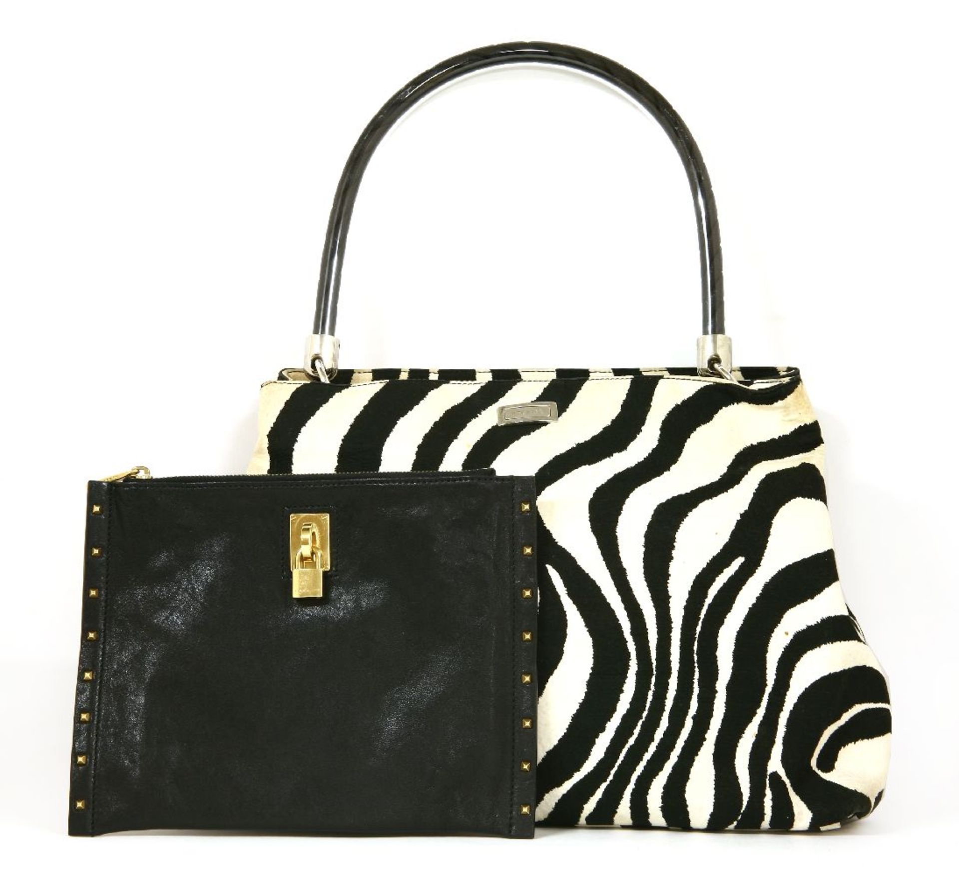 An Escada zebra patterned tote shopper handbag,with woven black and clear plastic handles, and a