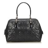 A Dior handbag,featuring a cannage perforated leather body, silver-tone hardware, flat patent