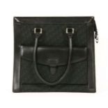 A Christian Dior shopper,monogrammed fabric and smooth black leather, with a pocket to the