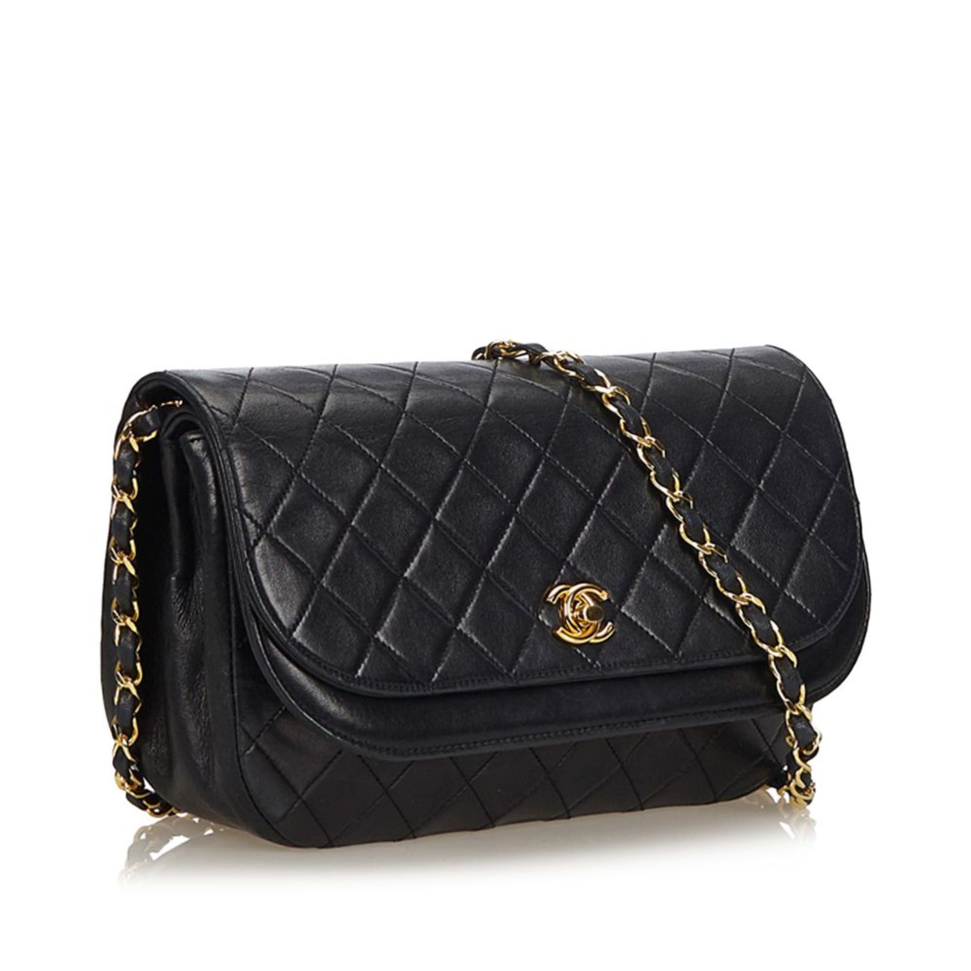 A Chanel matelassé half moon flap shoulder bag,with a leather body, gold-tone chains, a double - Bild 2 aus 4