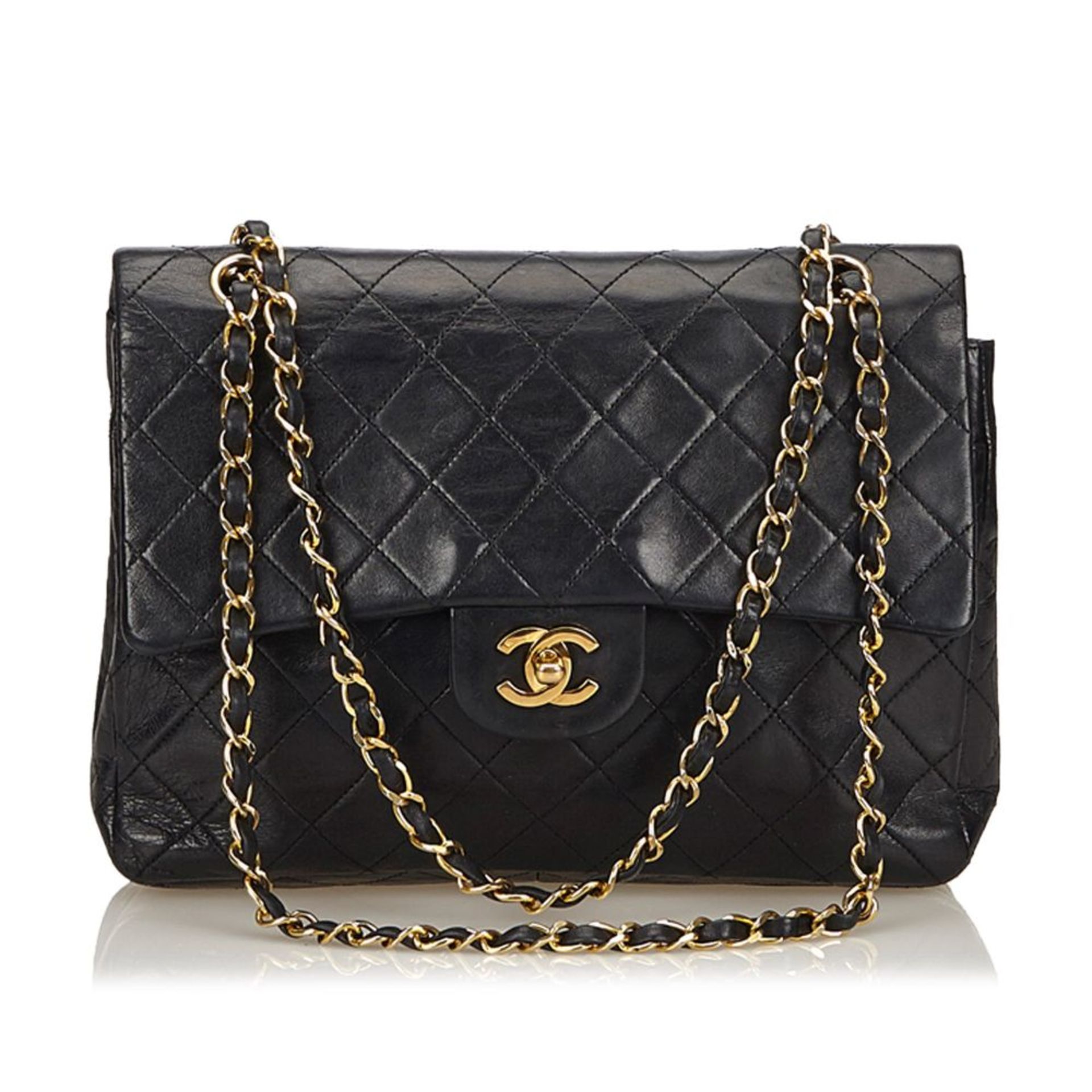 A Chanel classic medium double flap shoulder bag,featuring a quilted leather body, chain shoulder
