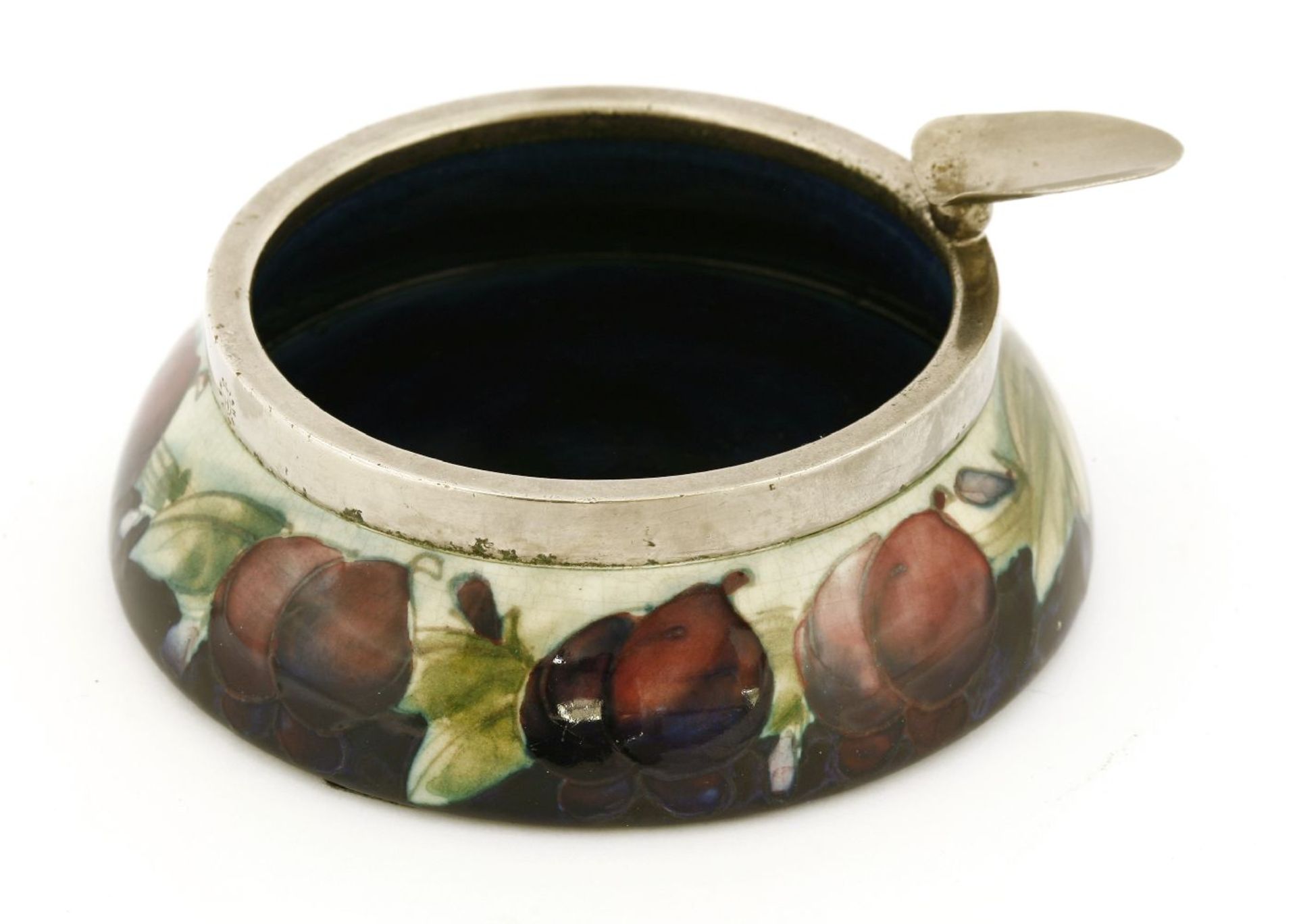 A Moorcroft 'Wisteria' ashtray,with a silver-plated mount, with cigarette rest, stamped marks,11.5cm