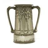 A Liberty & Co. Tudric pewter twin-handled vase, designed by David Veazey, moulded with stylised