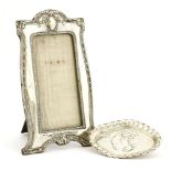 A silver photograph frameby W H Leather & Son, Birmingham, 1911,with an easel back,17.5cm wide