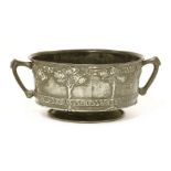 A Liberty & Co. Tudric pewter twin-handled bowl,designed by David Veazey, moulded with stylised
