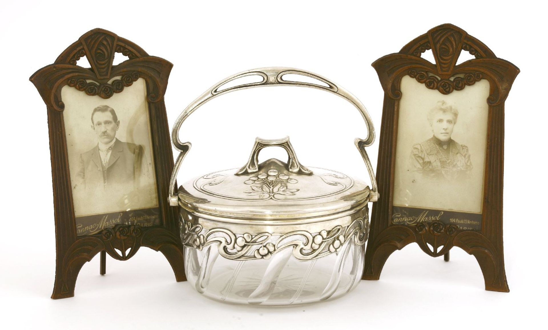 A WMF silver-plated preserve dish and cover,with a swing handle, with a stylised pierced mount and