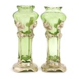 A pair of WMF vases,with green glass vases mounted in silvered stands, stamped marks,29cm high (2)