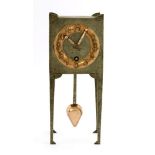 A Nieuwe Kunst mantel clock,after a design by Johannes Cornelis Stoffels, with a copper chapter