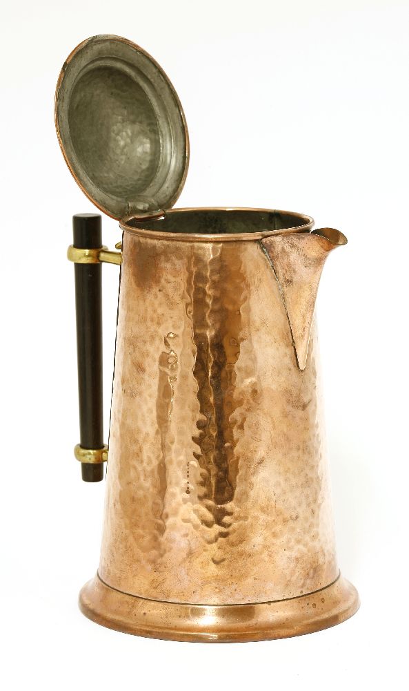 A copper jug,after a Christopher Dresser design for Henry Loveridge, with a hammered finish and a - Image 2 of 2