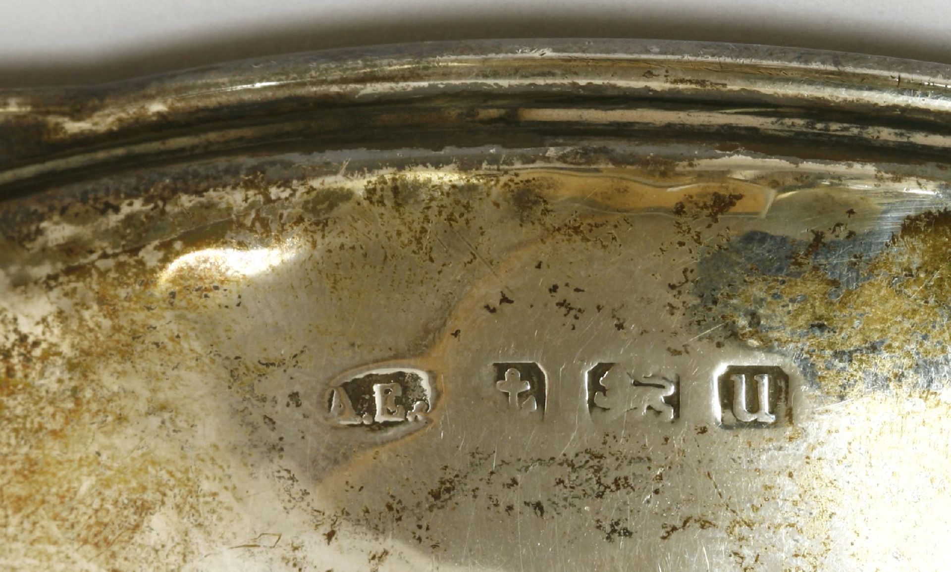 A silver dish,A E Jones, Birmingham, 1919, of circular form with twin handles mounted with a rose - Image 2 of 3