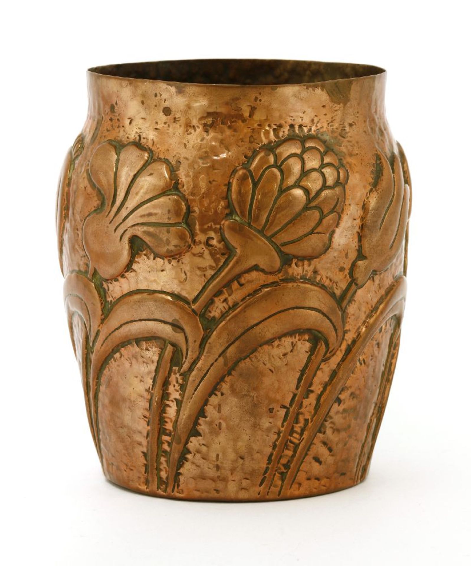 A copper vase,by John Pearson, embossed with flowers on a hammered ground, struck 'J.P. 1908' and