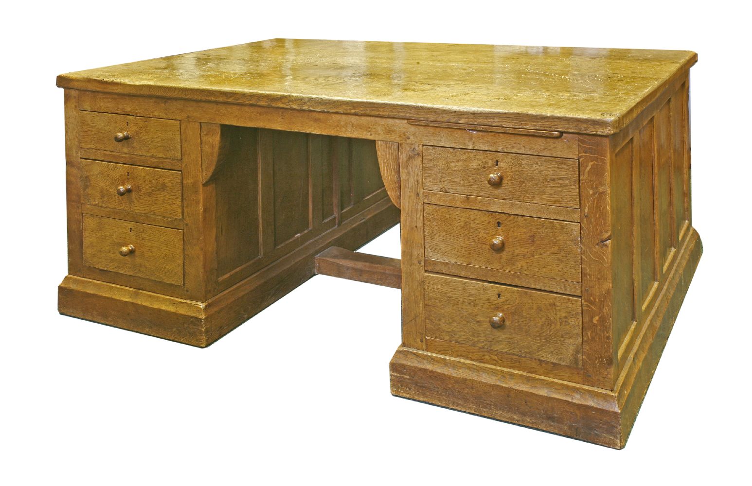A Robert ‘Mouseman’ Thompson oak partners' desk,with an adzed top and scrolled corners with three
